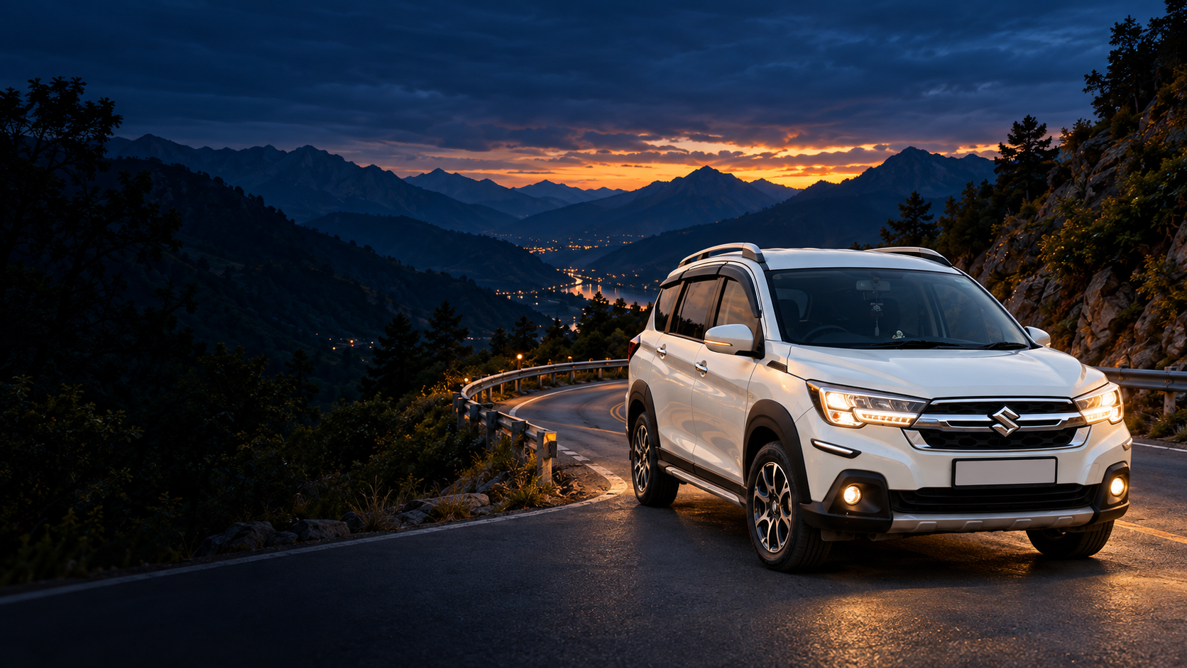 White Maruti Suzuki XL6 on a Himalayan mountain road at sunset